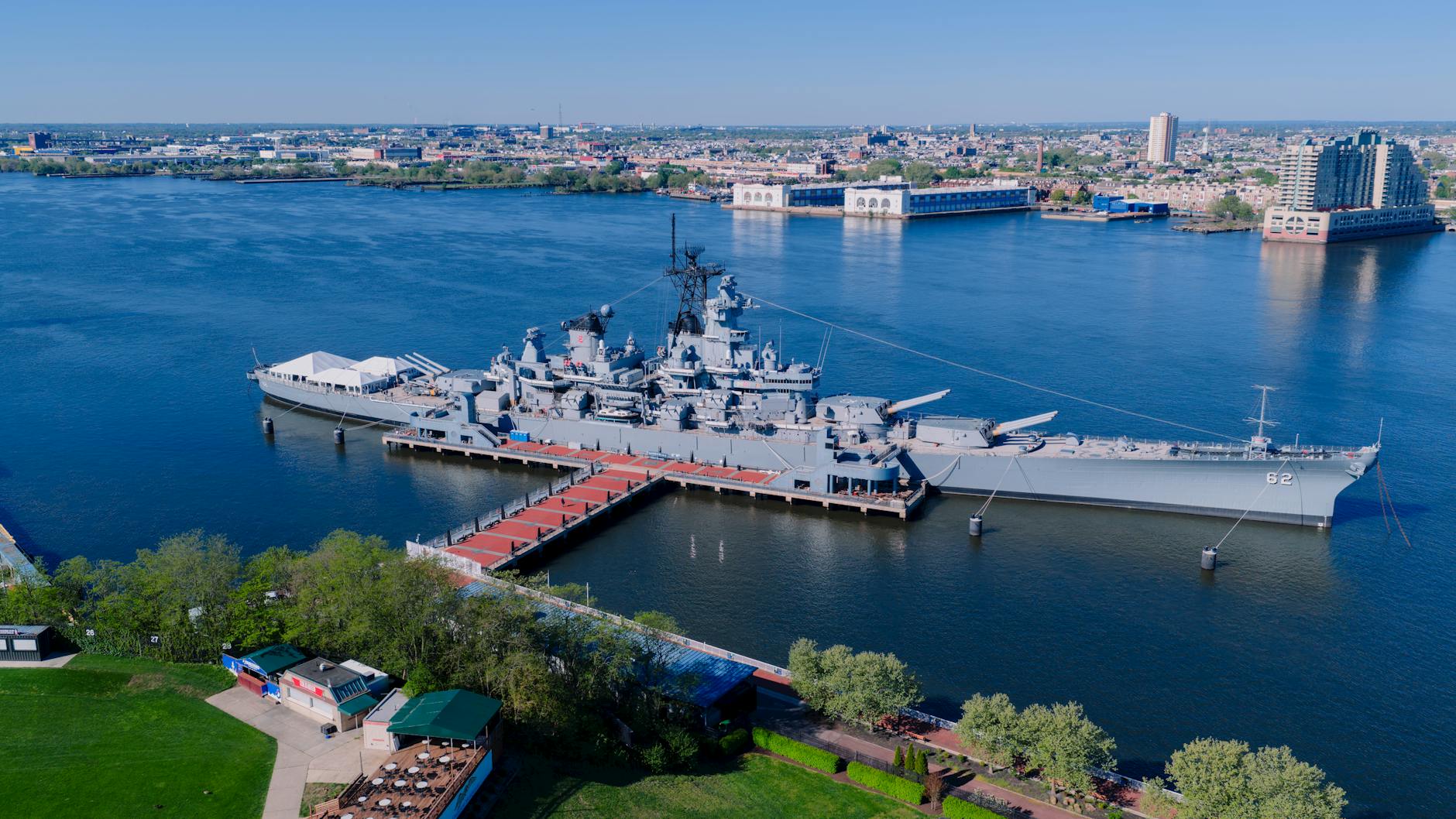 Stunning aerial shot of the USS New Jersey battleship docked in Philadelphia, Pennsylvania.