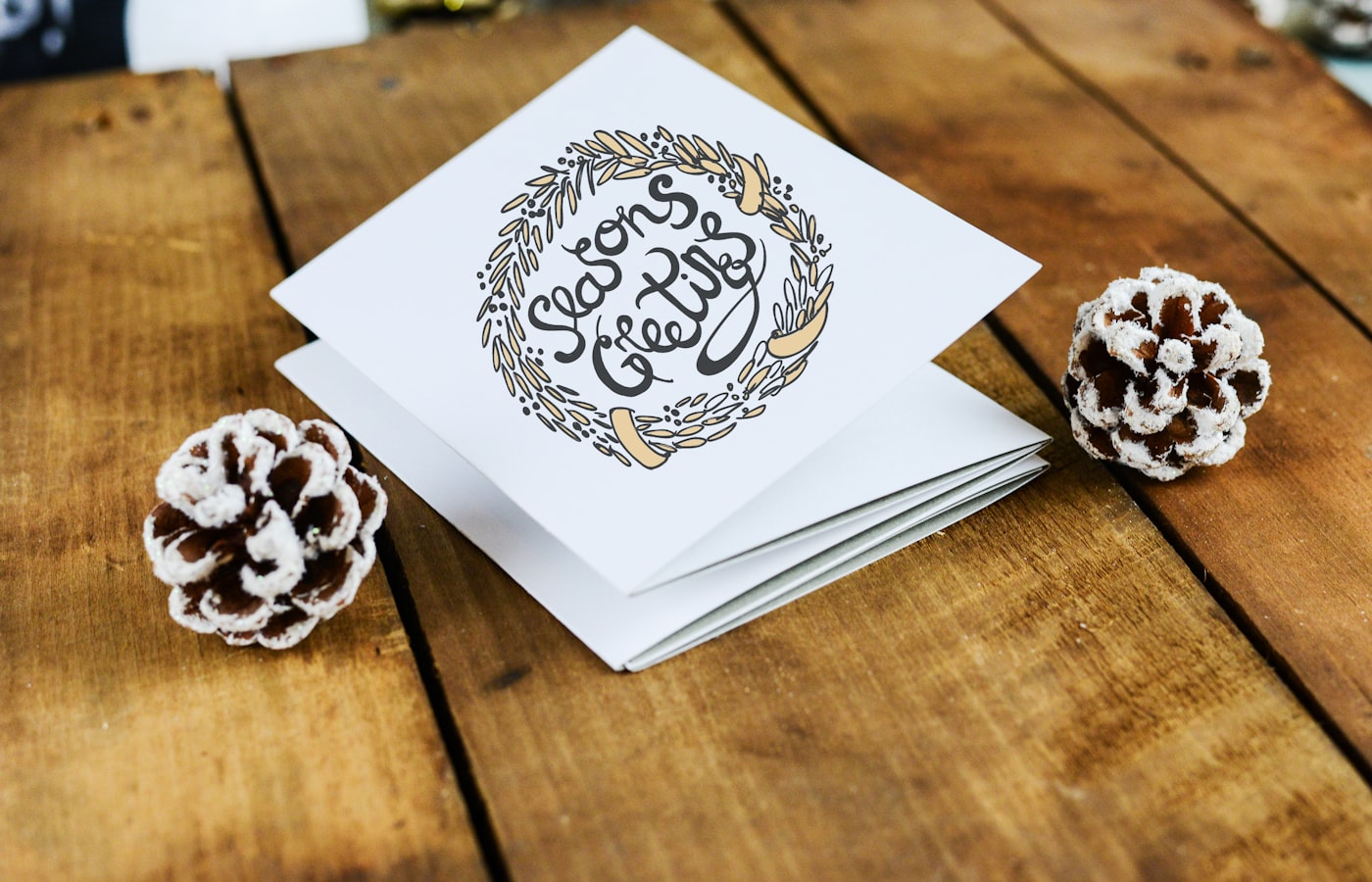 white labeled card on wooden surface