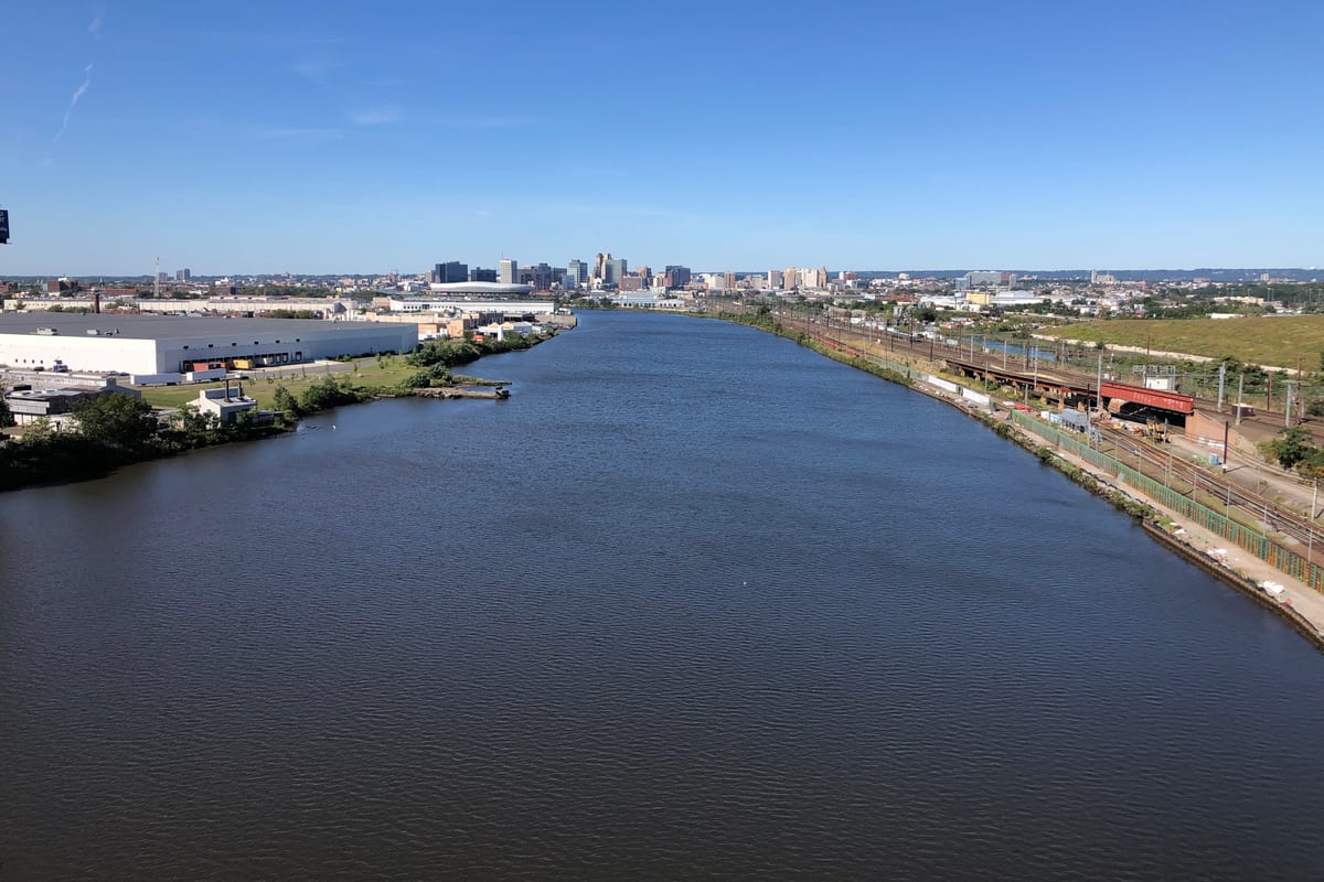 Passaic, NJ — 2021-09-19 10 21 28 View west up the Passaic River towards downtown Newark from the Harry Laderman Bridge for Interstate 95W (New Jersey Turnpike Western Spur) along the border of Newark, Essex County and Kearny, Hudson County in New Jersey